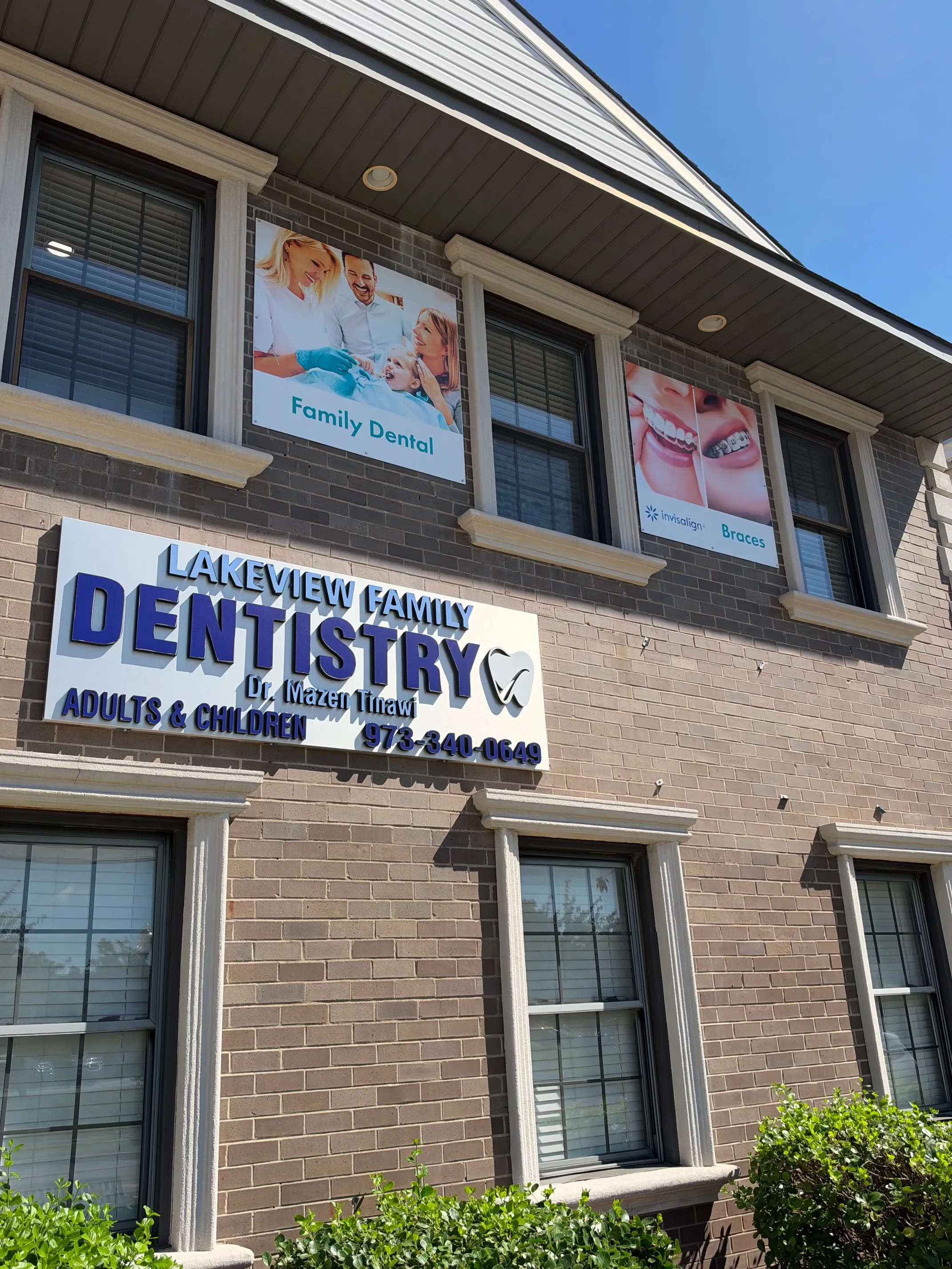 The Lakeview Family Dentistry sign with Dr. Mazen Tinawi's name, beneath window banners for family dental, Invisalign and braces.